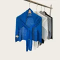 Detailed view of a stylish lightweight knit shawl scarf, soft fabric texture for summer. - 180cm / Klein Blue