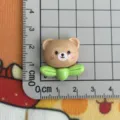 Glossy resin bear charm with green leaf base for DIY phone case hairpin decoration detail - Brown Leaf Bear