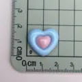 Ciondolo a cuore in resina lucida bicolore per fermagli per capelli e fai da te. - Blu