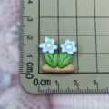 Resin flower cabochon detail view, cute blue floral craft accessory for DIY phone case decor. - Double Flower Shape / Blue