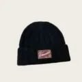 Classic black knitted beanie hat for women, winter warm wool cap with stylish brand patch. - One Size / Black