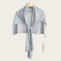 Close-up detail of the lightweight grey knitted shawl, showing fine knit texture and T-shape style. - 180cm / Gray