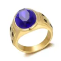 Close-up of vintage gold-plated men's ring with large oval blue zircon and cross totem - Size 7 / Blue