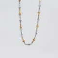 Detail view of two-tone stainless steel cross chain necklace with gold and silver crosses. - Two-tone (Gold & Silver)