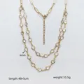 Collana a doppio strato in acciaio inossidabile con pietre di cristallo chiare, gioiello. - Rotondo / Bianco