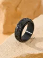 Detail view of vintage black star rotatable ring with 2cm/0.7inch diameter measurement - Size 7 / Black