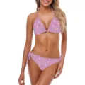 Primo piano di un bikini rosa con stampa a coriandoli colorati e lacci laterali regolabili. - Taglia S / Viola chiaro