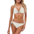 Vista dettagliata del set bikini bianco con motivo a coriandoli e laccetti laterali - Taglia S / Bianco Latte