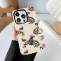 Detailed macro view of the vintage cowboy and horse illustration on a beige iPhone case. - Denim 4 / iPhone X/XS