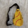 Detailed view of a yellow canvas chest bag with vibrant red baseball stitch embroidery - Yellow Softball