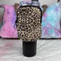 Leopard print neoprene pouch attached to a black 40oz tumbler for essentials storage. - Leopard Print