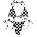 Detailed view of black and white checkerboard printed bikini set with tie-side design - White & Black Plaid
