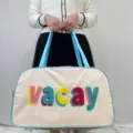 Large capacity travel tote bag featuring colorful chenille embroidery with 'vacay' text - Vacay