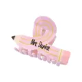 Detailed macro view of a pink pencil-shaped acrylic hair claw with customized name engraving - #7 Pink Striped Criss-cross Pencil Claw Clip