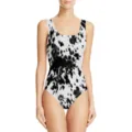 Front view of a women's one-piece swimsuit featuring a stylish black and white cow print - XXS / Leopard 4
