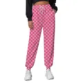 Close-up of pink checkered joggers with drawstring waist and elastic ankle cuffs - Rose Red Plaid Style