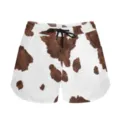 Detailed view of cow print sports shorts with black drawstring and side pocket detail - S / Bottoms / Cow Print 1