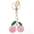 Pendentif porte-clés cerise en velours rose avec feuilles pailletées et fermoir doré - Rose Floké