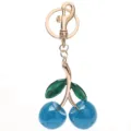 Porte-clés cerise en résine pailletée bleue avec quincaillerie dorée pour décoration de sac - Bleu Pailleté