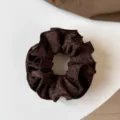 Detail view of Korean style dark brown leopard print fabric hair scrunchie for women. - Double Layer Scrunchie / Coffee Leopard Print