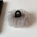Detailed shot of glittering organza hair claw with rhinestones and shimmering silver wire. - Champagne Pink Starry / 13cm Version / Champagne Pink