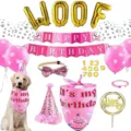Detailed view of a pink pet birthday party decoration set with banners and balloons - Pink Set