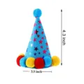 Detailed view of blue pet birthday party hat with stars and colorful pom-poms, 4.3 inch height - Blue Hat