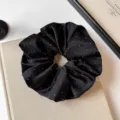 Elegant black satin hair scrunchie with sparkling rhinestones for daily chic low ponytail styling. - L / Black