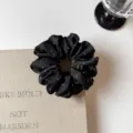Close-up of black satin hair scrunchie with rhinestones, elegant Korean style hair tie. - S / Black