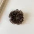 Close-up detail of a brown floral sheer organza scrunchie, showcasing textured fabric and design. - S / Brown Mesh Print