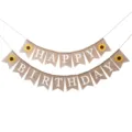 Macro detail of rustic Happy Birthday burlap bunting banner featuring sunflower designs - Sunflower Happy Birthday Banner