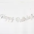 Close-up of reflective silver Happy Birthday cursive letter banner for party wall decoration - Silver HAPPY BIRTHDAY