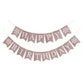 Detailed view of a rustic Happy Birthday burlap banner with white letters and snowflakes - Snowflake Birthday