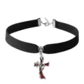 Detail shot of black velvet choker necklace featuring silver skeleton cross pendant dark style. - Skull Cross