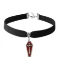Gothic black velvet choker necklace featuring a red enamel coffin sword pendant detail. - Cross Coffin