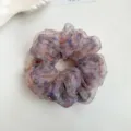 Detailed shot of a romantic fluffy organza rhinestone printed hair scrunchie for women. - Pink-Purple Rhinestone Floral