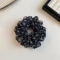 Detailed shot of black polka dot sheer mesh scrunchie, lightweight fluffy hair accessory. - Black Polka Dot Small Scrunchie Style (FQ-1112)