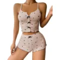 Set pigiama rosa costine con cuori neri e fiocchi carini, canotta comoda e pantaloncini. - Cuore nero su fondo nudo