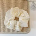 Floral embroidered scrunchie hair tie elegant daisy hair accessory for women daily styling. - Daisy Embroidery