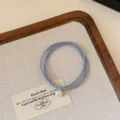 French chic pearl hair tie with elegant elastic rubber band for daily hair styling - Light Blue