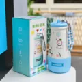 Detailed shot of a cute 460ml cartoon stainless steel thermos water bottle with strap. - XDFZY5533 Cute Puppy Style / 460ml / Blue