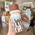 Creative cute baby bottle vacuum thermos flask with straw, portable strap and cartoon design. - 500ml / YY-8281 Brown