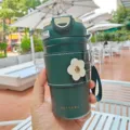Dark green portable insulated coffee cup with leather sleeve and cute white flower decor. - 450ml / Dark Green Flower (BW1853)