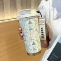 Tasse a cafe isotherme portable elegante avec motif de cage a oiseaux et sangle de transport. - 0623 tout renaît