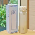 Stainless steel vacuum insulated water bottle with dual-drinking lid, 480ml capacity, beige. - KP7385 Style / 16oz / Milk White