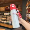 Silver stainless steel portable thermos water bottle with red pop-up lid and lanyard for daily. - 500ml / 2197 Series / Red Silver