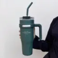 Large capacity insulated tumbler with handle and straw, stainless steel travel mug. - Green