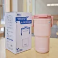Bicchiere isolato sottovuoto in acciaio inossidabile rosa 710 ml con manico per uso quotidiano. - 24oz / Rosa
