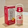 Portable stainless steel vacuum insulated water bottle with cute apple cartoon pattern design. - Red (BWB6140)