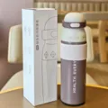 Tragbare Isolierflasche mit Silikonhuelle und 700ml Kapazitaet für den taeglichen Gebrauch. - 700ml / Aprikose